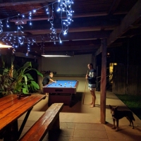 Backpackers are fun - Liam learning Aussie rules. (One involved dropping your pants and running around the table. Good news he didn't get that foul)