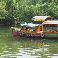 Boat in Backwaters - I loved the flowers on the bow