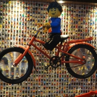 lego dude on a bike/magnifying glass