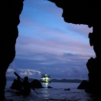 Caves, boat, sunset 2