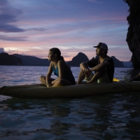 Caves, boat, sunset